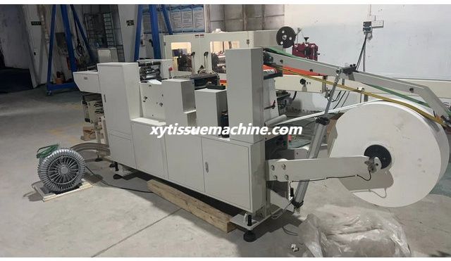 Machine automatique de fabrication de papier pour mouchoirs de poche (1)